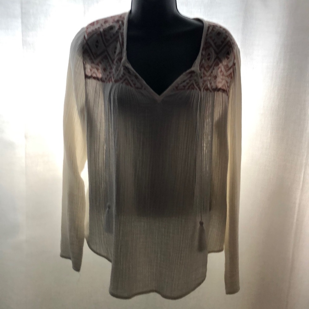 Boho embellished white cotton shirt with tassels.